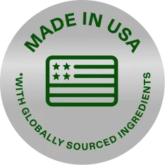 A silver seal reading Made in USA, with globally sourced ingredients, around a United States flag icon