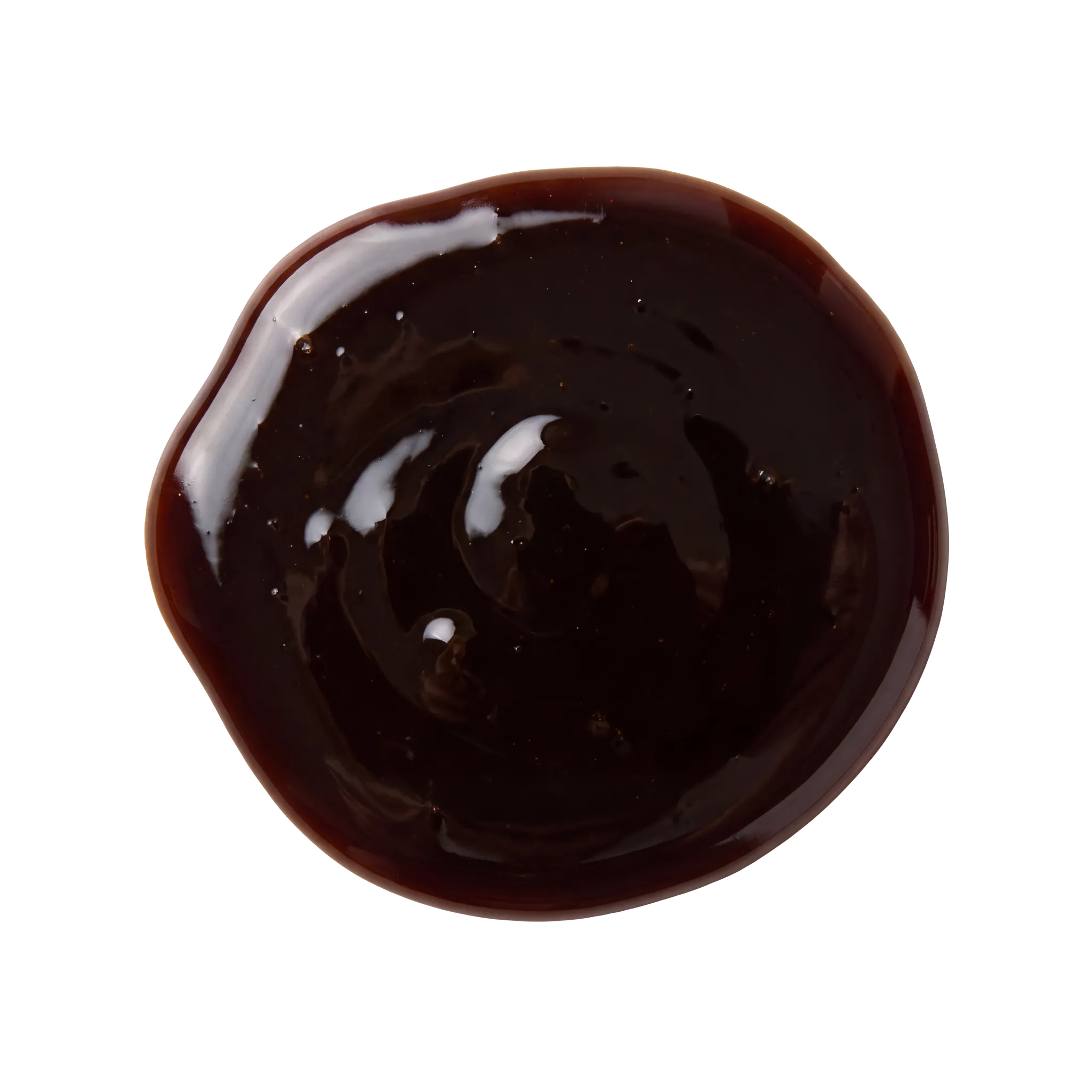 A glossy pool of dark molasses, viewed from above