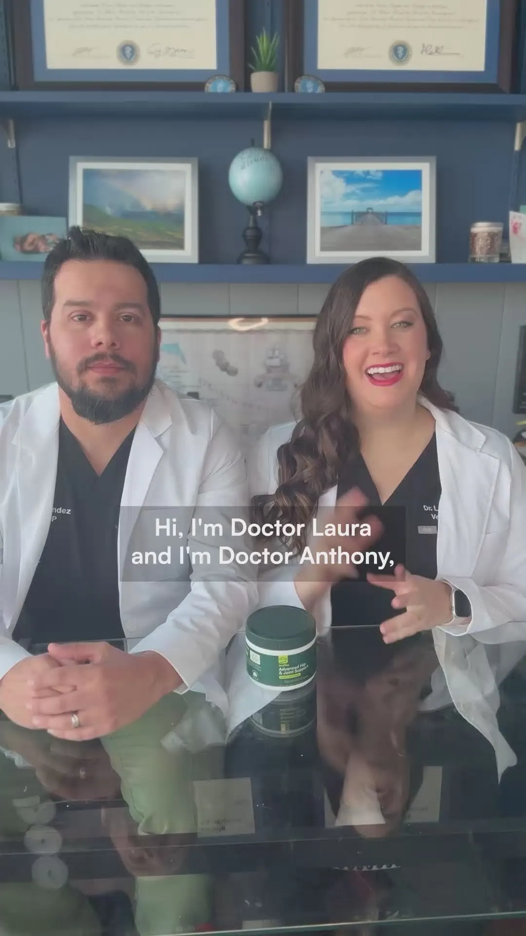 Two veterinarians, Dr. Laura and Dr. Anthony, in white coats at a desk with a jar of Wuffes Hip & Joint Chews, introducing themselves to camera