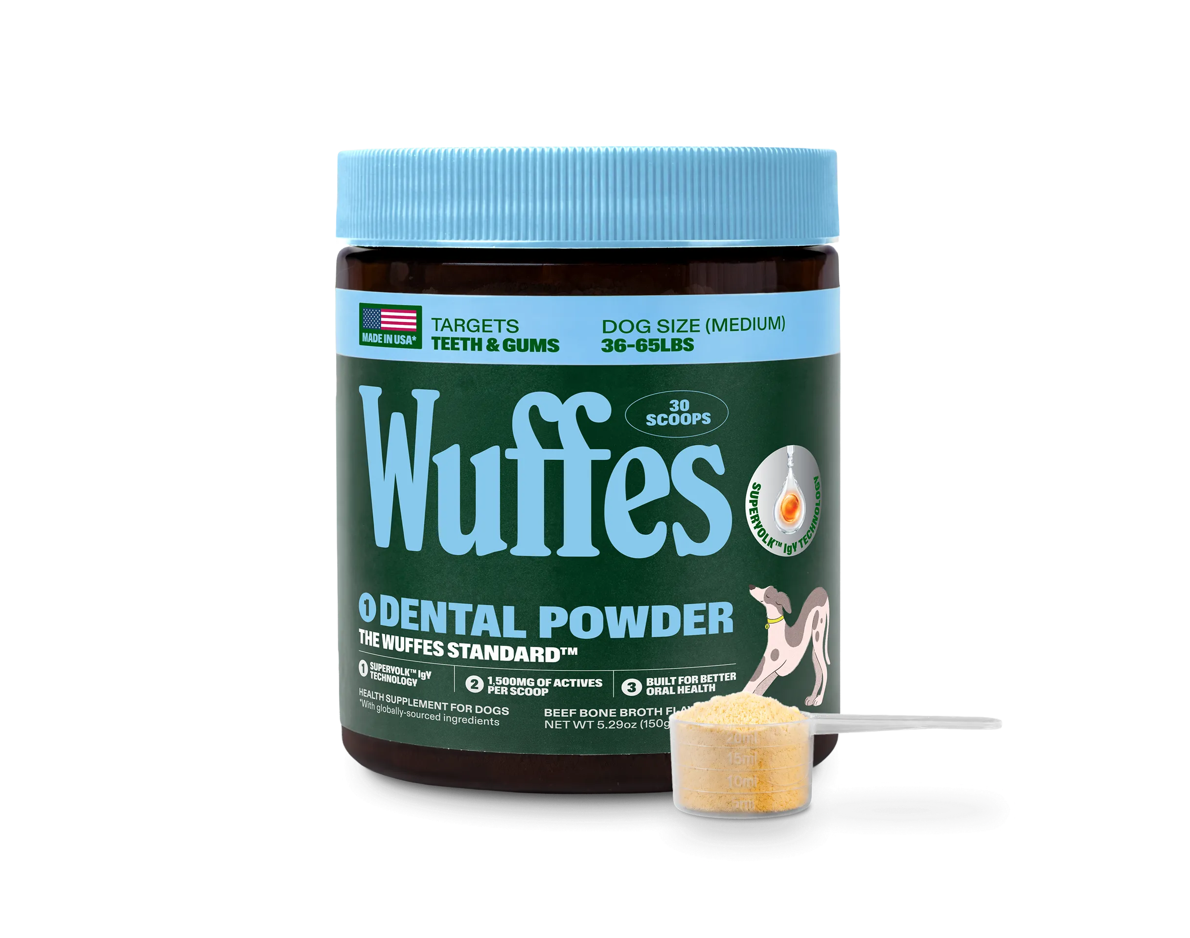 A dark green tub of Wuffes Dental Powder for dogs with a light blue lid, labelled for teeth and gums for medium dogs 36-65lbs, with a scoop of pale yellow powder in front of it