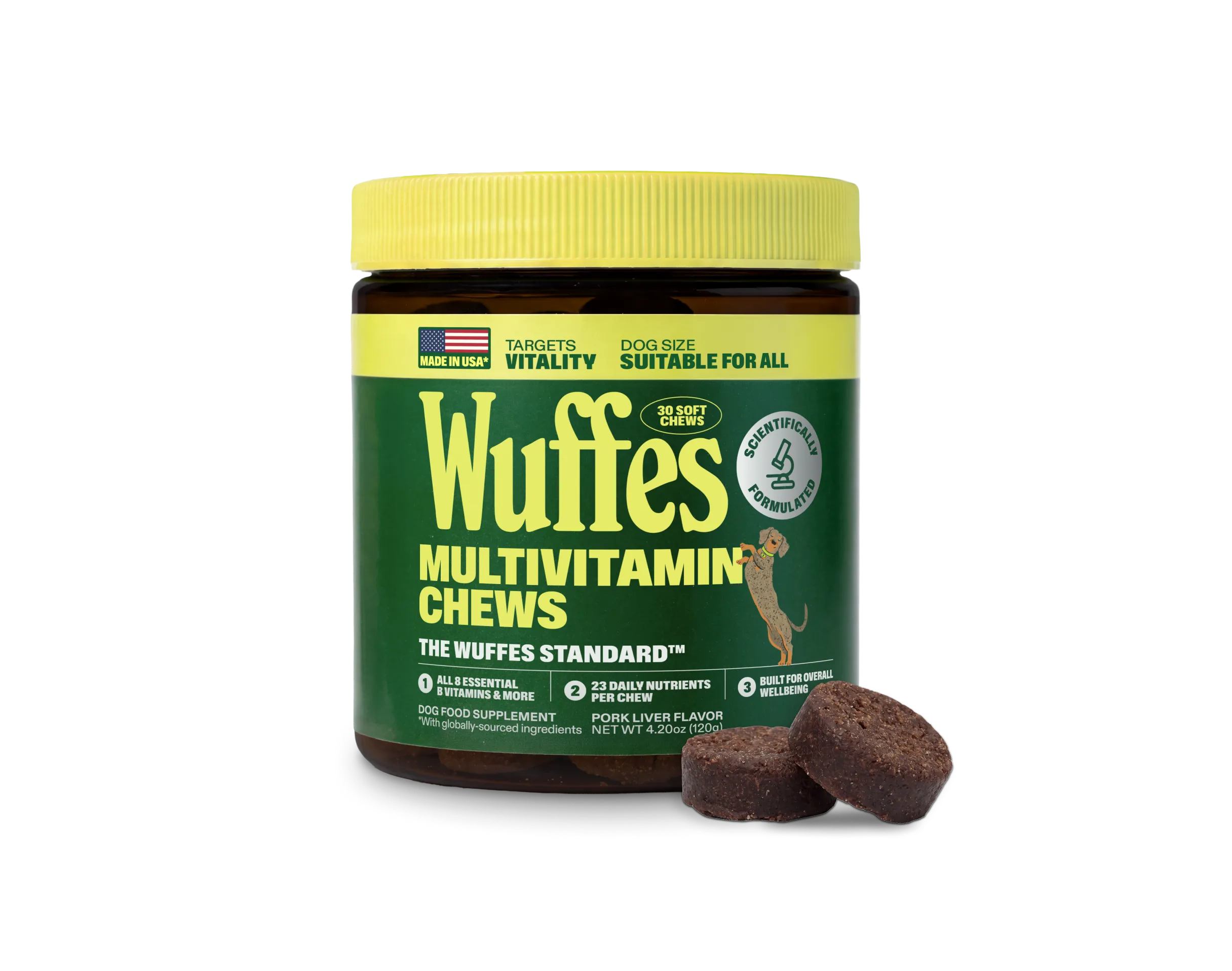 A dark amber jar of Wuffes Multivitamin Chews for dogs with a yellow lid, labelled for vitality and suitable for all dog sizes, 30 soft chews, showing an illustrated leaping tan dog, two soft brown chews beside it