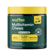 Container of wuffes multivitamin chews for dogs with yellow lid and green label.